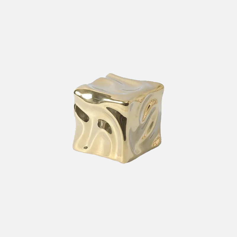 Draped Ceramic Cube Ornament on a white studio background.